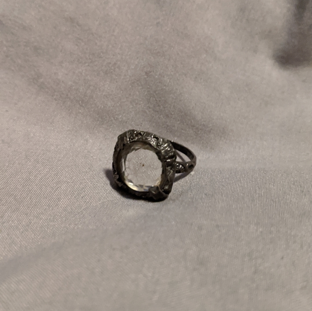 Ring with glass adornment